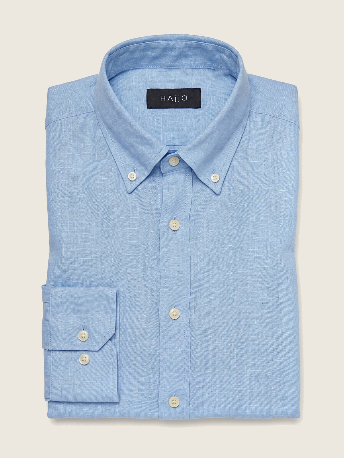 Linen Shirt, Light Sky Blue, folded, showing the collar and the Hajjo label