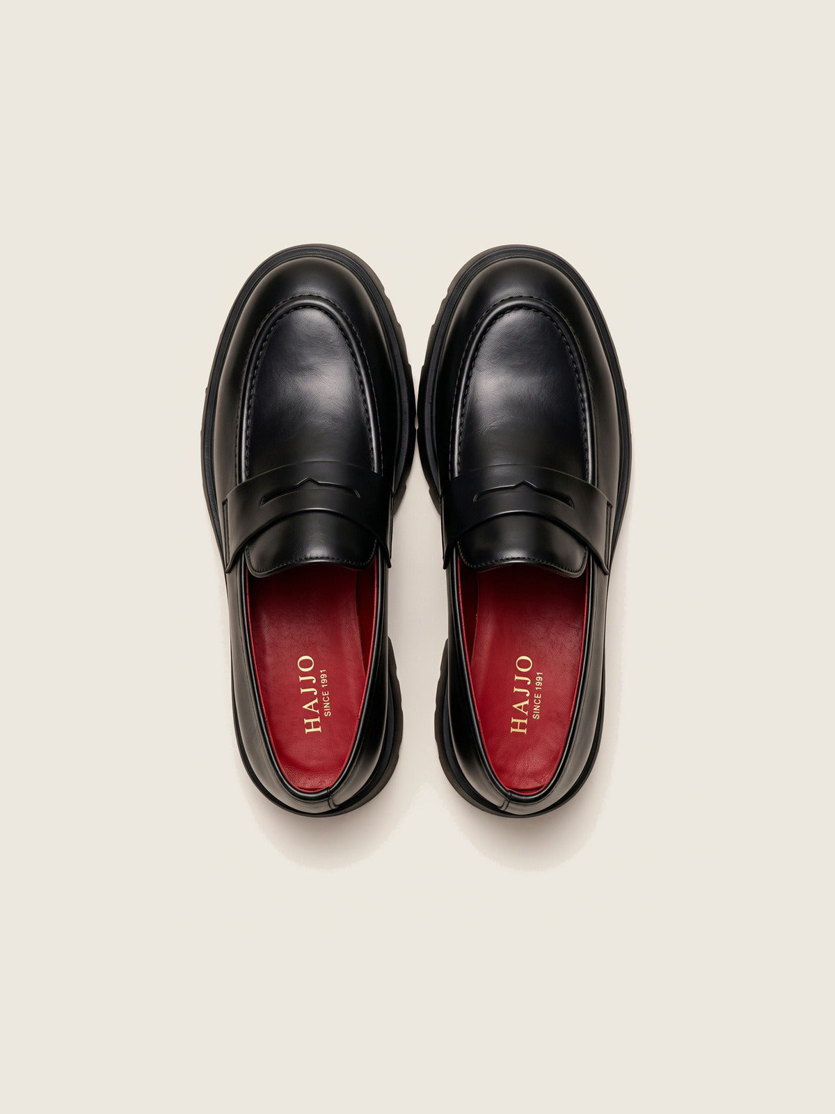 Penny Loafer, Black, the pair from above, showing the red insole