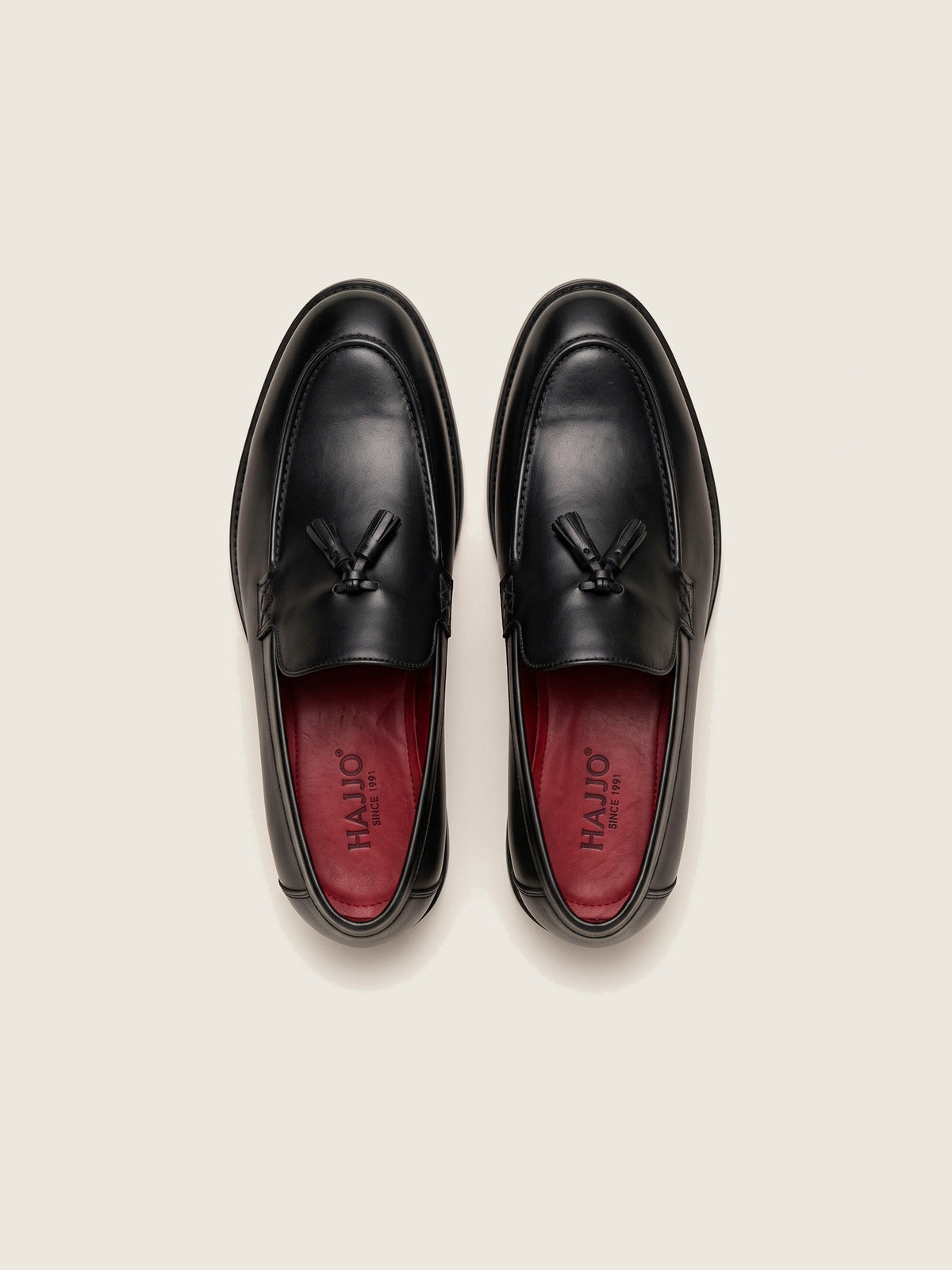 Tassel Loafer, Black, the pair from above, showing the red insole