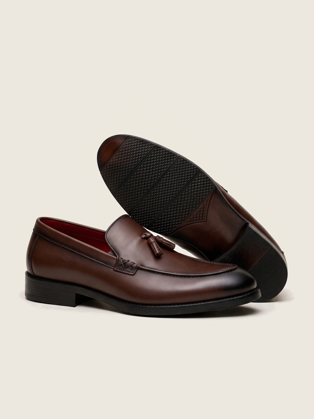 Tassel Loafer, Brown, the pair, one shoe showing the sole